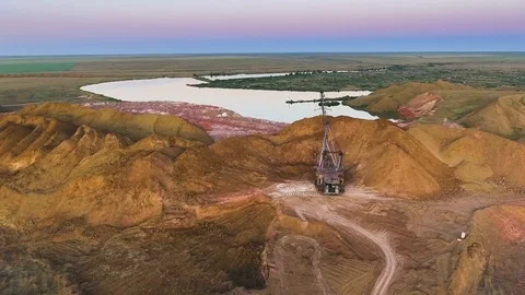 Panorama of the quarry. Artificial lake. Sunset. Horizon. Development of Stock Footage 74221026