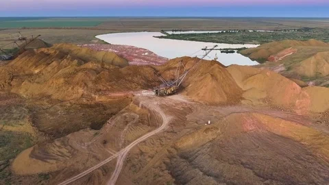 Panorama of the quarry. Artificial lake. Sunset. Horizon. Development of Stock Footage 74221429