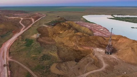 Panorama of the quarry. Artificial lake. Sunset. Horizon. Development of Stock Footage 74221532