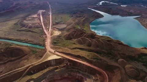 Panorama of the quarry. Artificial lake. Sunset. Horizon. Development of Stock Footage 74379747