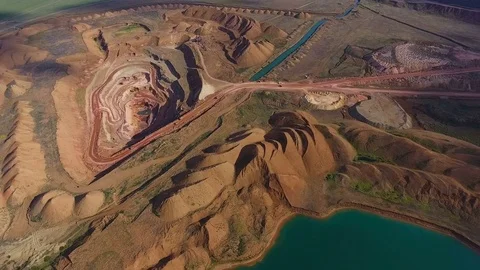 Panorama of the quarry. Artificial lake. Sunset. Horizon. Development of Stock Footage 74386038