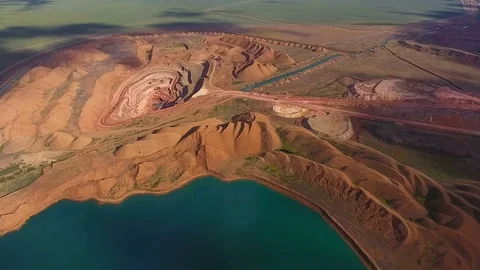 Panorama of the quarry. Artificial lake. Sunset. Horizon. Development of Video stock 75038697