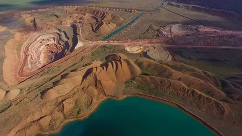 Panorama of the quarry. Artificial lake. Sunset. Horizon. Development of Video stock 75038946