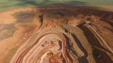 Panorama of the quarry. Artificial lake. Sunset. Barkhan sands. Development of Stock-Footage 75250226