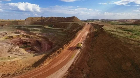 Panorama of the quarry. Artificial lake. Sunset. Barkhan sands. Development of Stock Footage 75265066