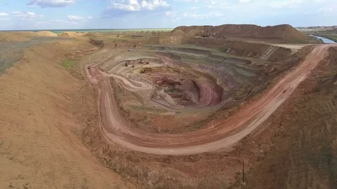 Panorama of the quarry. Artificial lake. Sunset. Horizon. Development of Stock Footage 75290036
