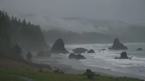 Panorama of remote wilderness with massive rocky formations in the ocean waters Stock Footage 232269722
