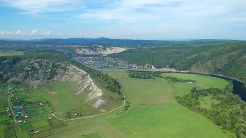 Panorama of a river valley with views of the mountains Stock Footage 114880179
