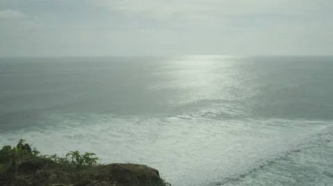 Panorama of rock and big wave at sunset in slow motion at Bali. Red Epic, 4K Stock Footage 49679198