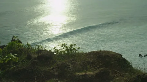 Panorama of rock and big wave at sunset in slow motion at Bali. Red Epic, 4K Stock Footage 49679261