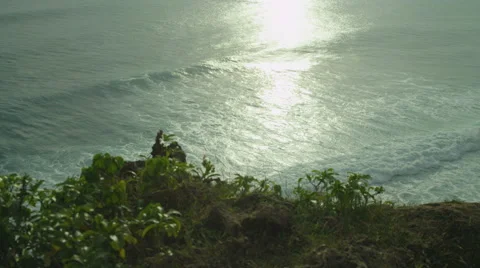 Panorama of rock and big wave at sunset in slow motion at Bali. Red Epic, 4K Stock Footage 49679455