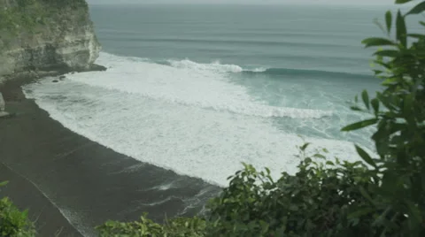 Panorama of rock and big wave in slow motion at Uluwatu, Bali. Red Epic, 4K Stock Footage 49679710