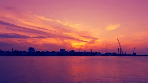 Panorama of rostock warnemünde at sunset - flying seagulls  - baltic sea Stock Footage 140462524