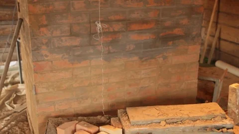 Panorama of a Russian brick rustic fireplace under construction Stock Footage 123801787