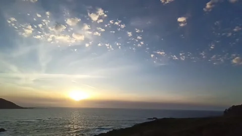 Panorama of the setting sun over the ocean Stock Footage 239334151