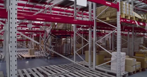 Panorama of shelves cardboard boxes storage warehouse 4k video. Stock interior Stock Footage 72219434