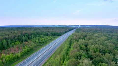 The panorama shot over the forest and the road. Stock Footage 112005483