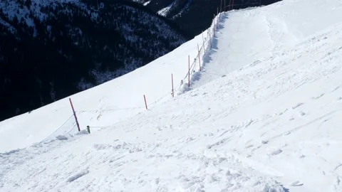 Panorama of the ski run in the winter mountains, people are skiing in the Stock Footage 169659529