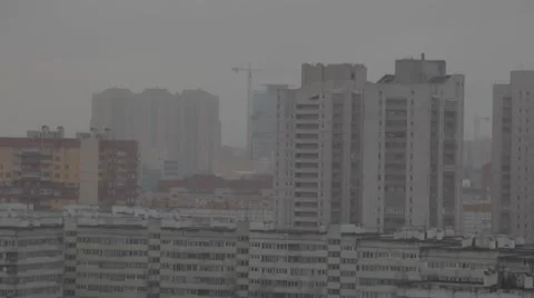 Panorama of sleeping quarters. Cloudy gray weather over a city. Raining. Stock Footage 50635392