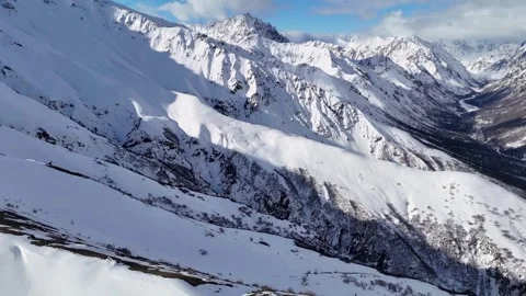 Panorama of a snowy mountain range. Stock Footage 310029937