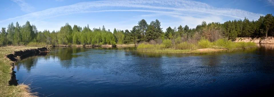 Panorama of the spring river. Stock Photos
