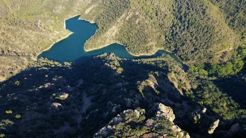 Panorama of a stone range against the backdrop of a lake Stock Footage 241246030