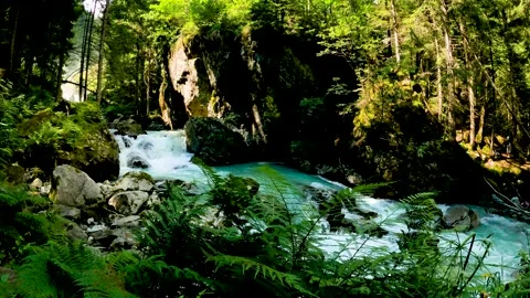 Panorama of a stream in the Alps - 5K Stock Footage 158818613