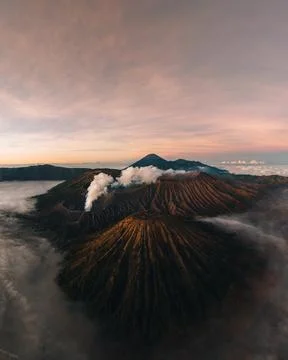 Panorama of Sunrise at volcano Bromo, Java island, Indonesia. Panoramic aerial Stock Photos