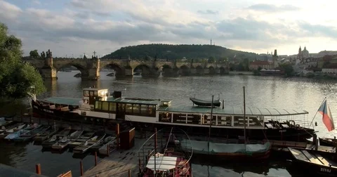 Panorama of the sunset on Vltava River &amp; Charles Bridge, Prague, Czech Republic Stock Footage 77057479