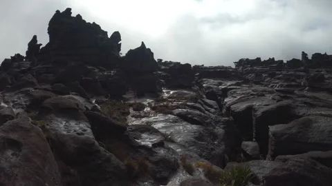 Panorama of Tepui Roraima flat topped mount with black volcanic rock formations Stock Footage 245498524