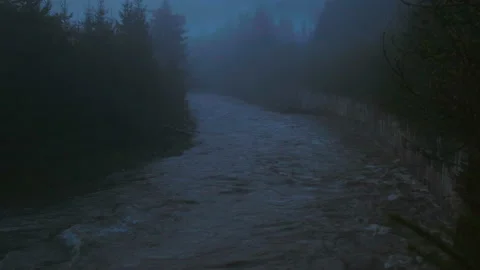 Panorama of the terrible river in the dark, after the rain Stock Footage 107725613