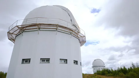 Panorama of the territory of the astronomical observatory high in the mountains Stock Footage 253627698