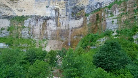 Panorama of thin Okatse waterfall on stone wall aerial view 스톡 동영상 95098086
