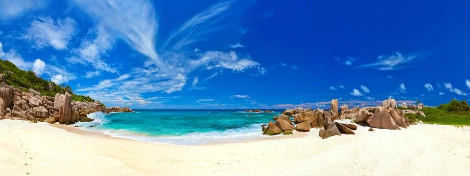 Panorama of tropical beach at Seychelles Stock Photos