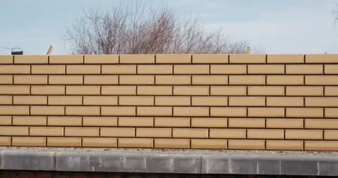 Panorama of unfinished brick wall, construction of house, beautiful orange brick Stock Footage 130367753
