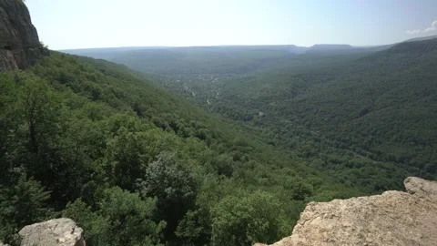 Panorama from valley to the huge vertical rocks in nature. Sunny day. Great for 動画素材 134512398
