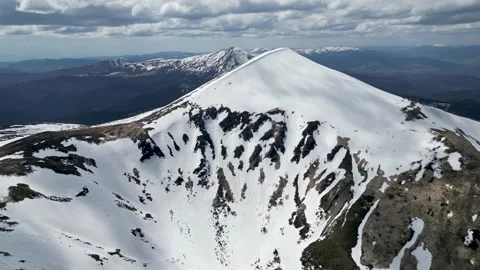 A panorama video of Hoverla mountain with snow on it, Carpathians Stock Footage 242811719