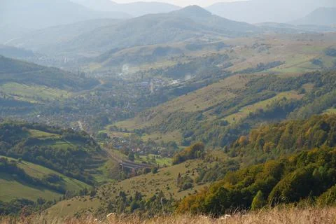 Panorama view of beautiful Carpathian mountains and village Stock Photos