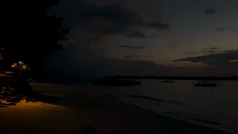 Panorama view of boats in th e beach after sunset Stock Footage 125842372