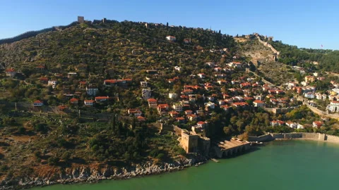 Panorama view from flying copter over ancient castle and sunny Alanya town Stock Footage 233968420