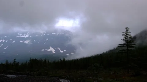 Panorama view of forest mountains and low clouds at Putorana plateau Stock Footage 170202717