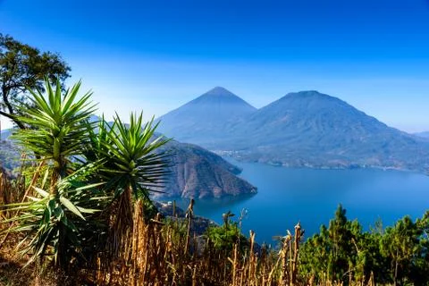 Panorama view of the lake Atitlan and volcanos  in the highlands of Guatemala 库存照片