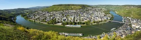 Panorama view of riverside village along the curve of the river with hillside vi Stock Photos