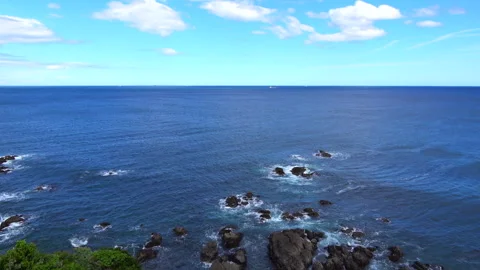Panorama view shot of the clean transparent sea wave rushing to the shore. 4K Stock Footage 276592865