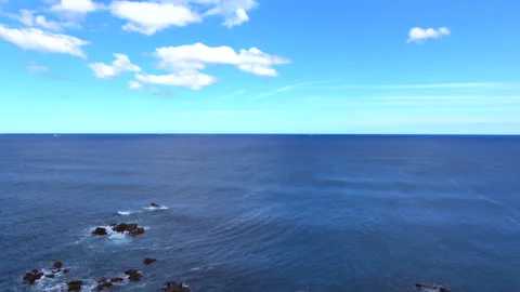 Panorama view shot of the clean transparent sea wave rushing to the shore. 4K Stock Footage 276592987