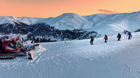 Panorama view of ski professionals walking on mountains with amazing views. Stock Footage 236934855