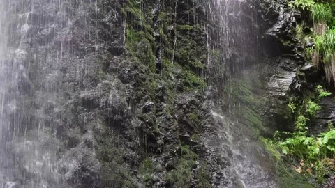 Panorama of the Waterfall stormy stream of falling icy water black rock Stock Footage 137920070