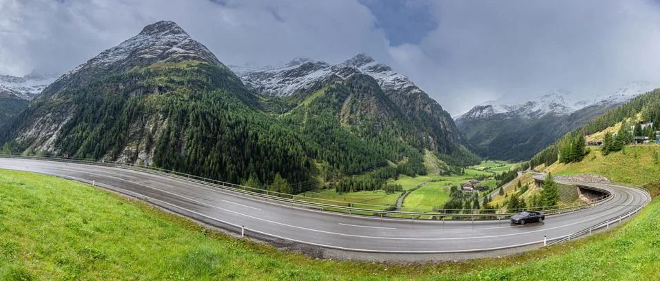 Panorama of winding asphalt road in Dolomites Stock Photos