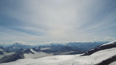 Panorama of winter mountains with clouds, Elbrus landscape Stock Footage 143680400