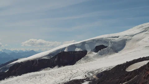 Panorama of winter mountains with clouds, Elbrus landscape Stock Footage 143680422
